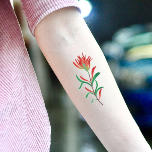 fake small indian paintbrush flower temporary tattoo sticker design idea on inner arm