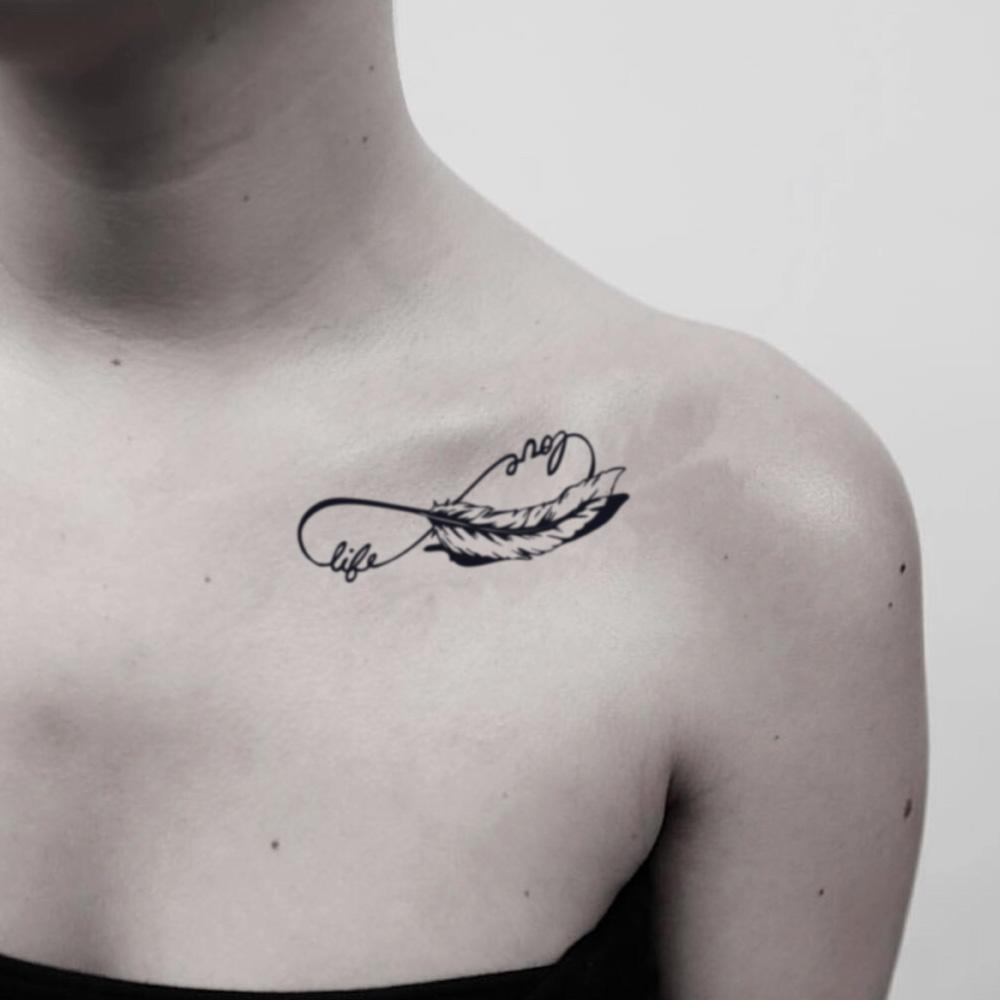 fake small infinity with feather illustrative temporary tattoo sticker design idea on shoulder
