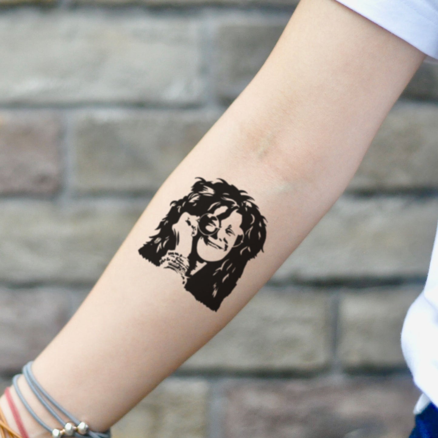 fake small janis joplin portrait temporary tattoo sticker design idea on inner arm
