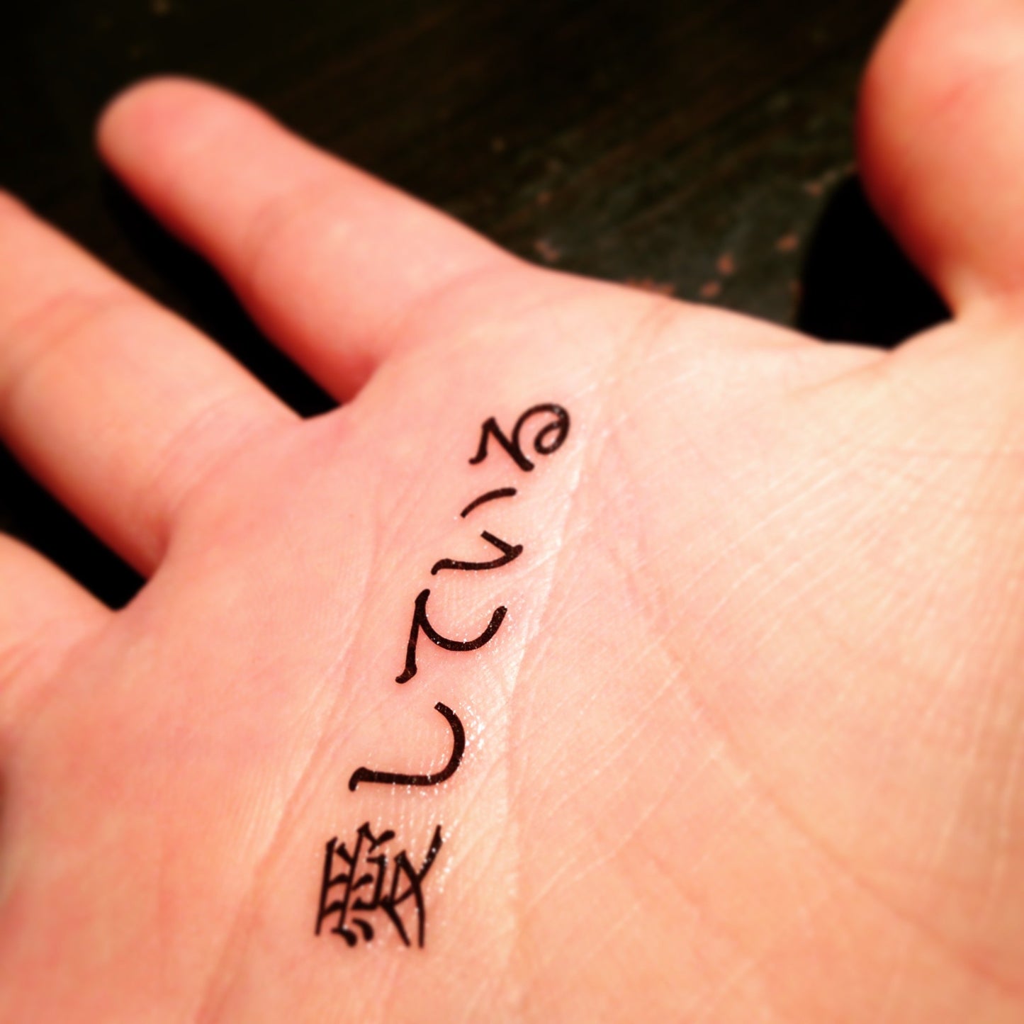 fake small japanese i love you lettering hand palm temporary tattoo sticker design idea on wrist