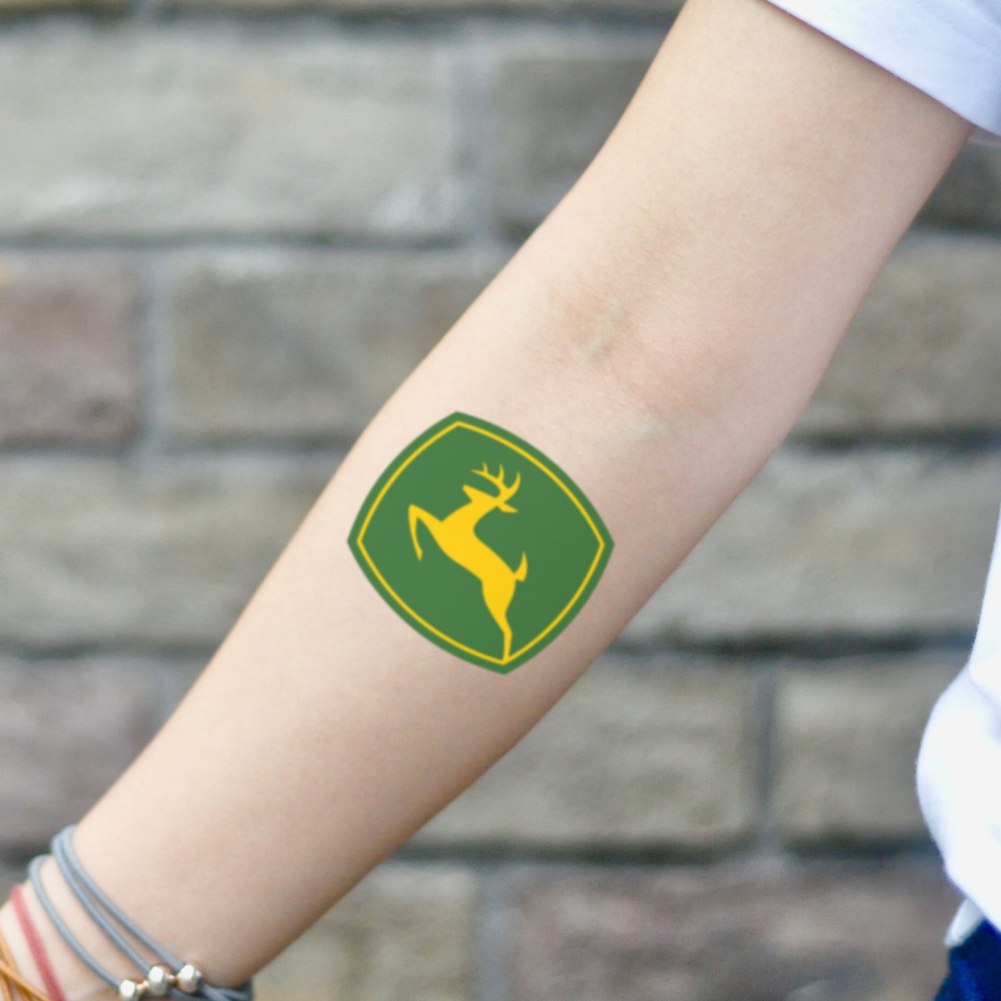 fake small john deere color temporary tattoo sticker design idea on inner arm