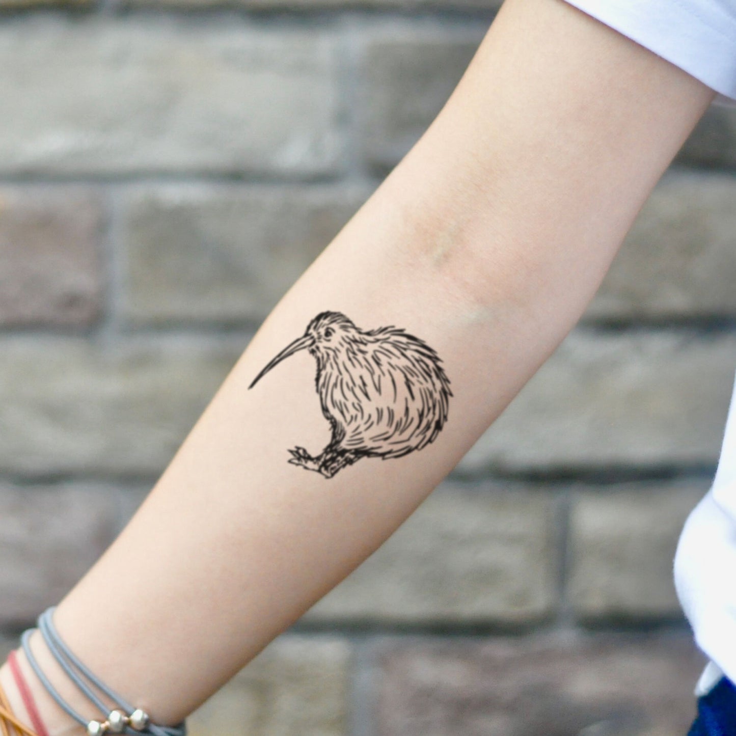 fake small kiwi bird animal temporary tattoo sticker design idea on inner arm