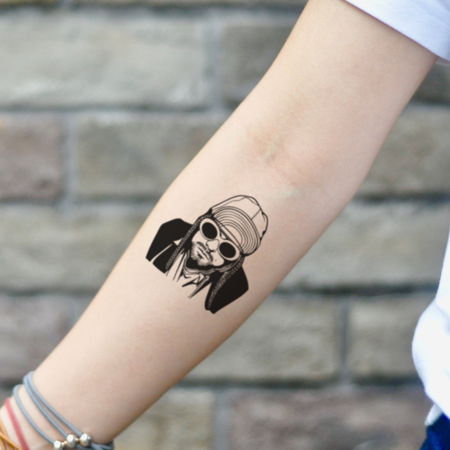 fake small kurt cobain portrait temporary tattoo sticker design idea on inner arm