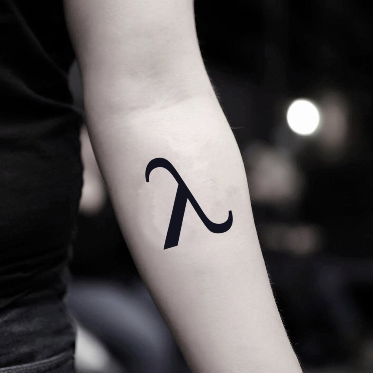 fake small lambda minimalist temporary tattoo sticker design idea on inner arm