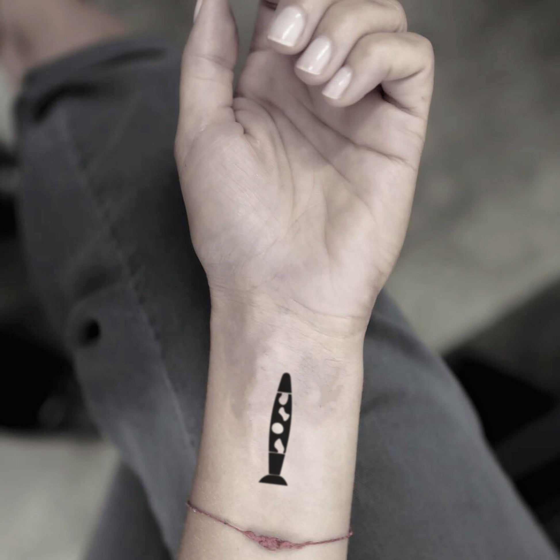 fake small lava lamp minimalist temporary tattoo sticker design idea on wrist