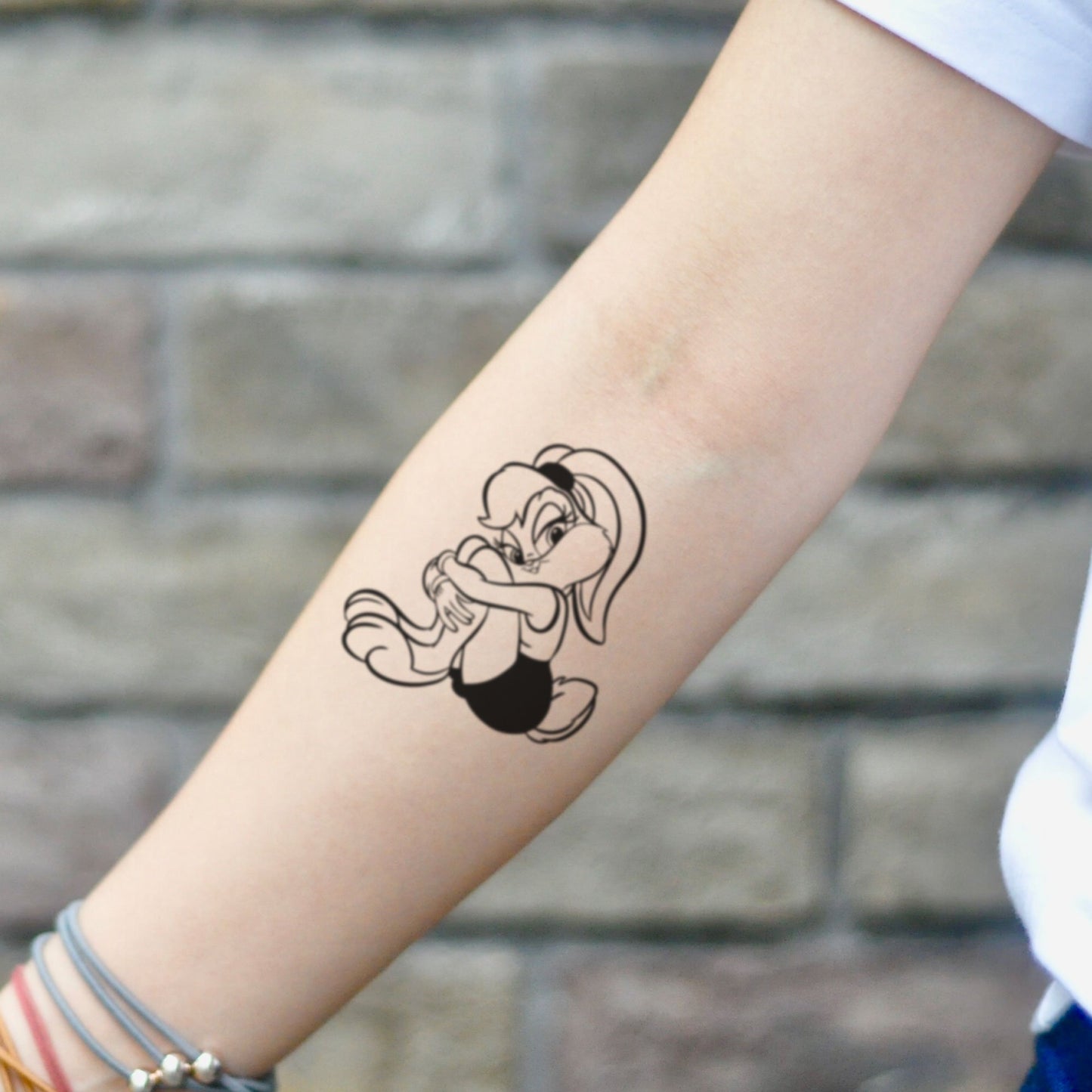 fake small lola bunny cartoon temporary tattoo sticker design idea on inner arm