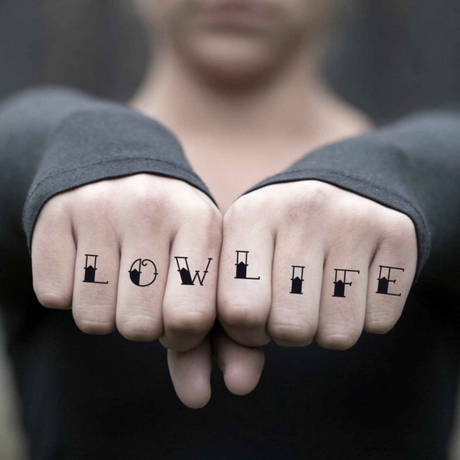fake small low life lettering temporary tattoo sticker design idea on finger