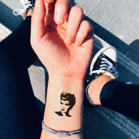 fake small lucille ball portrait temporary tattoo sticker design idea on wrist