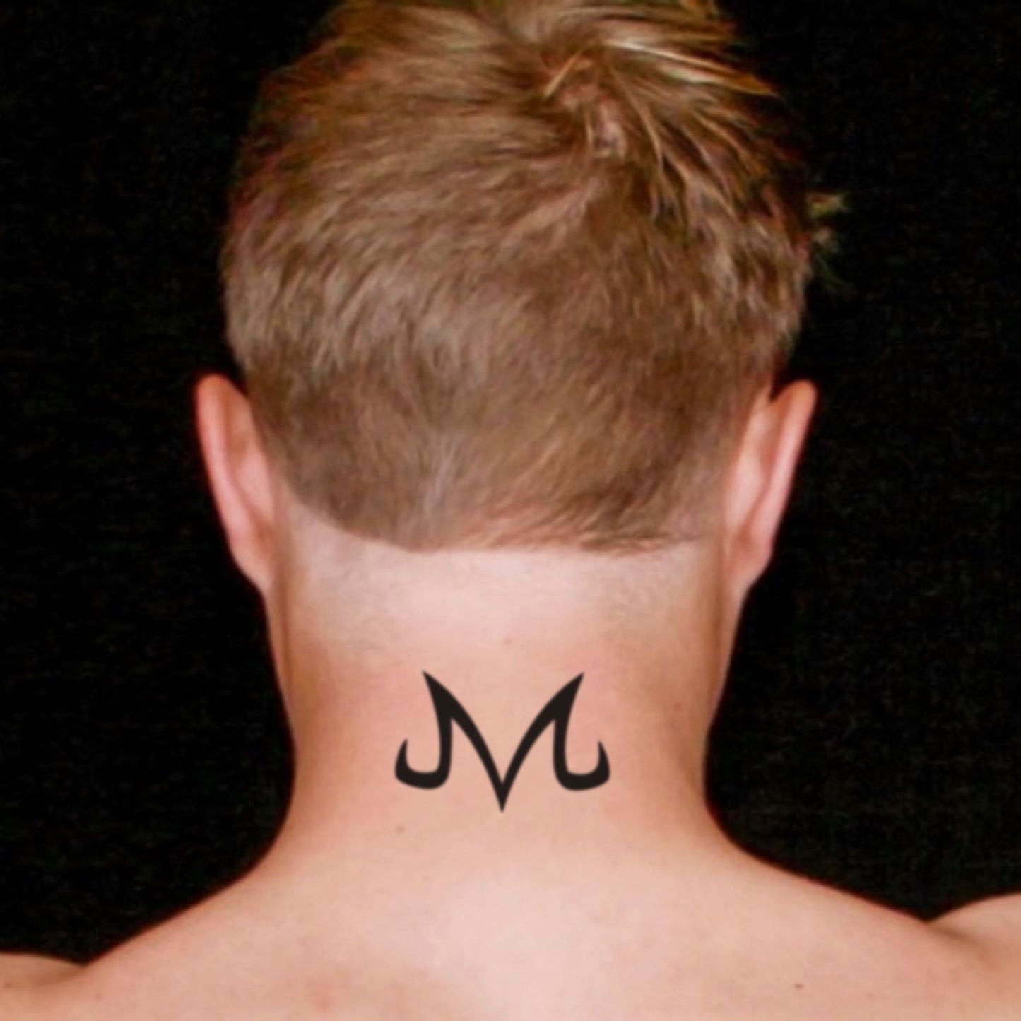 fake small majin m logo dragon ball z male model lettering temporary tattoo sticker design idea on neck