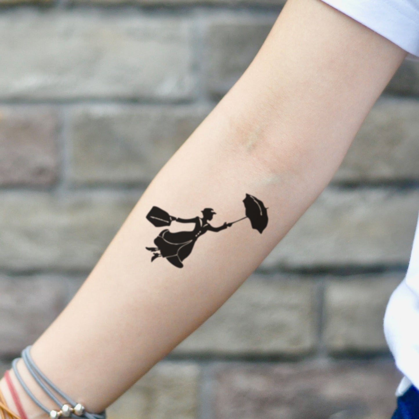 fake small mary poppins minimalist temporary tattoo sticker design idea on inner arm