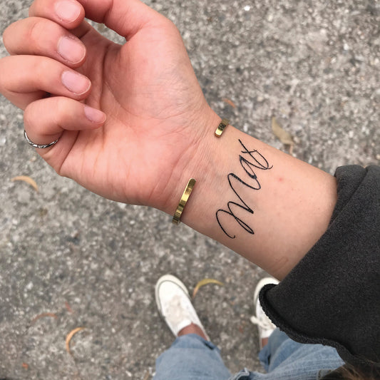 fake small max maximum lettering temporary tattoo sticker design idea on wrist