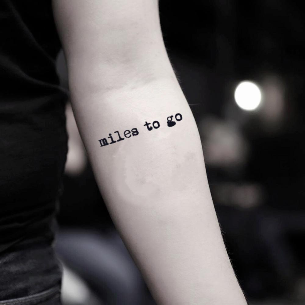 fake small miles to go quote lettering temporary tattoo sticker design idea on inner arm