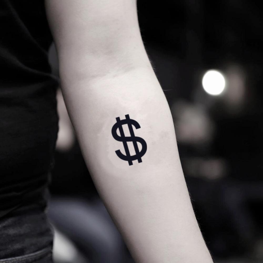 fake small money sign minimalist temporary tattoo sticker design idea on inner arm