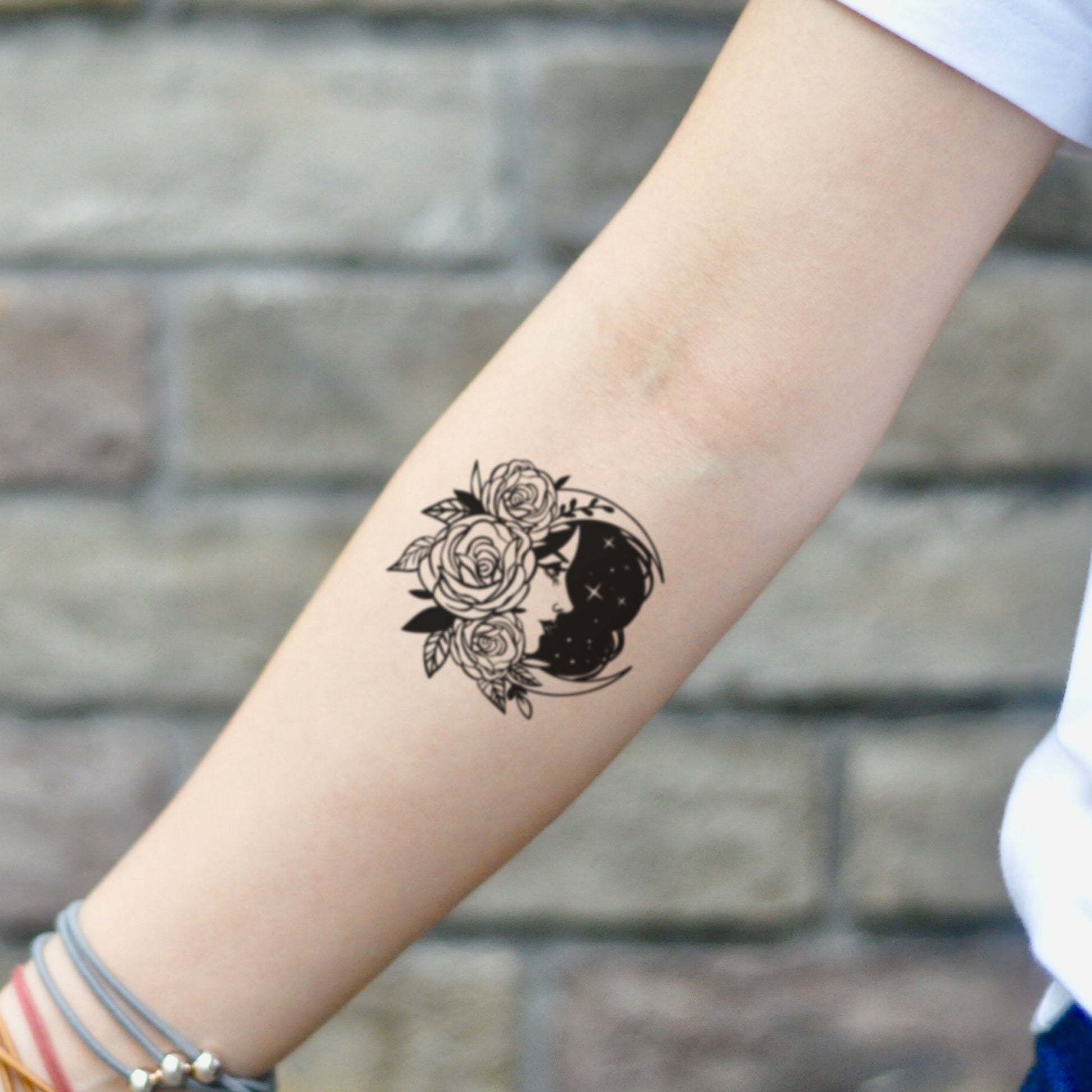 fake small moon, stars and rose illustrative temporary tattoo sticker design idea on inner arm