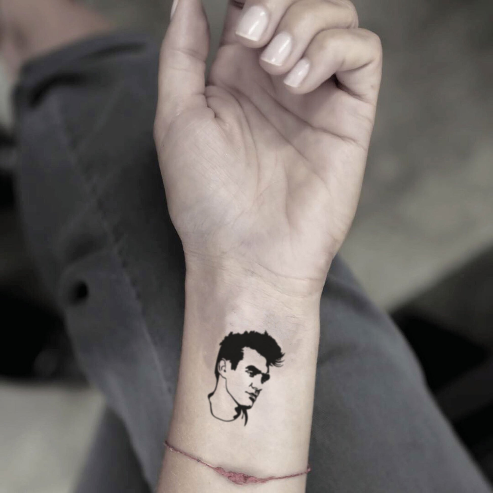 fake small morrissey outline portrait temporary tattoo sticker design idea on wrist