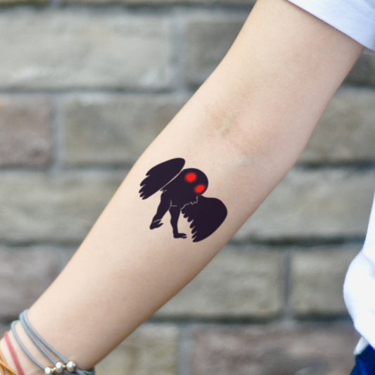 fake small mothman illustrative temporary tattoo sticker design idea on inner arm