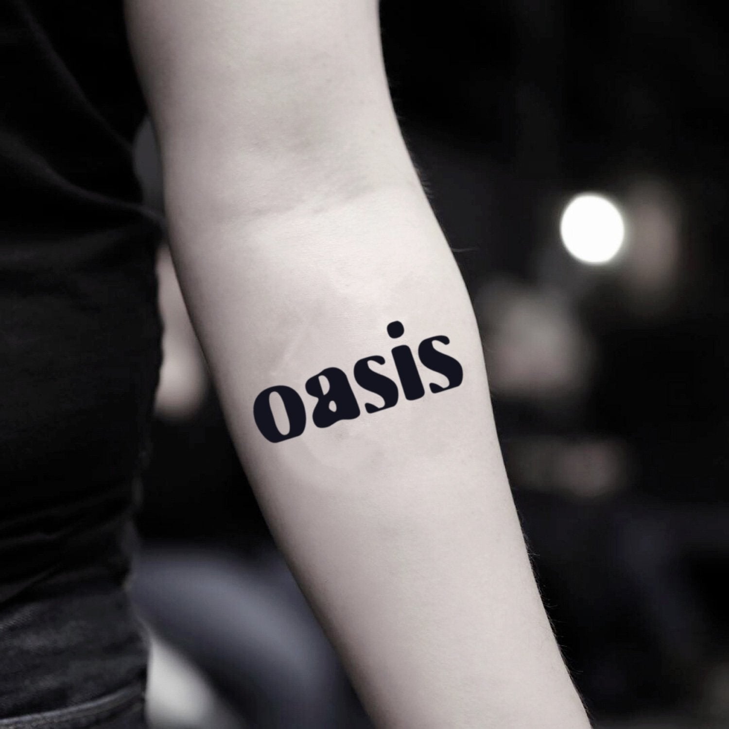 fake small oasis lettering temporary tattoo sticker design idea on inner arm