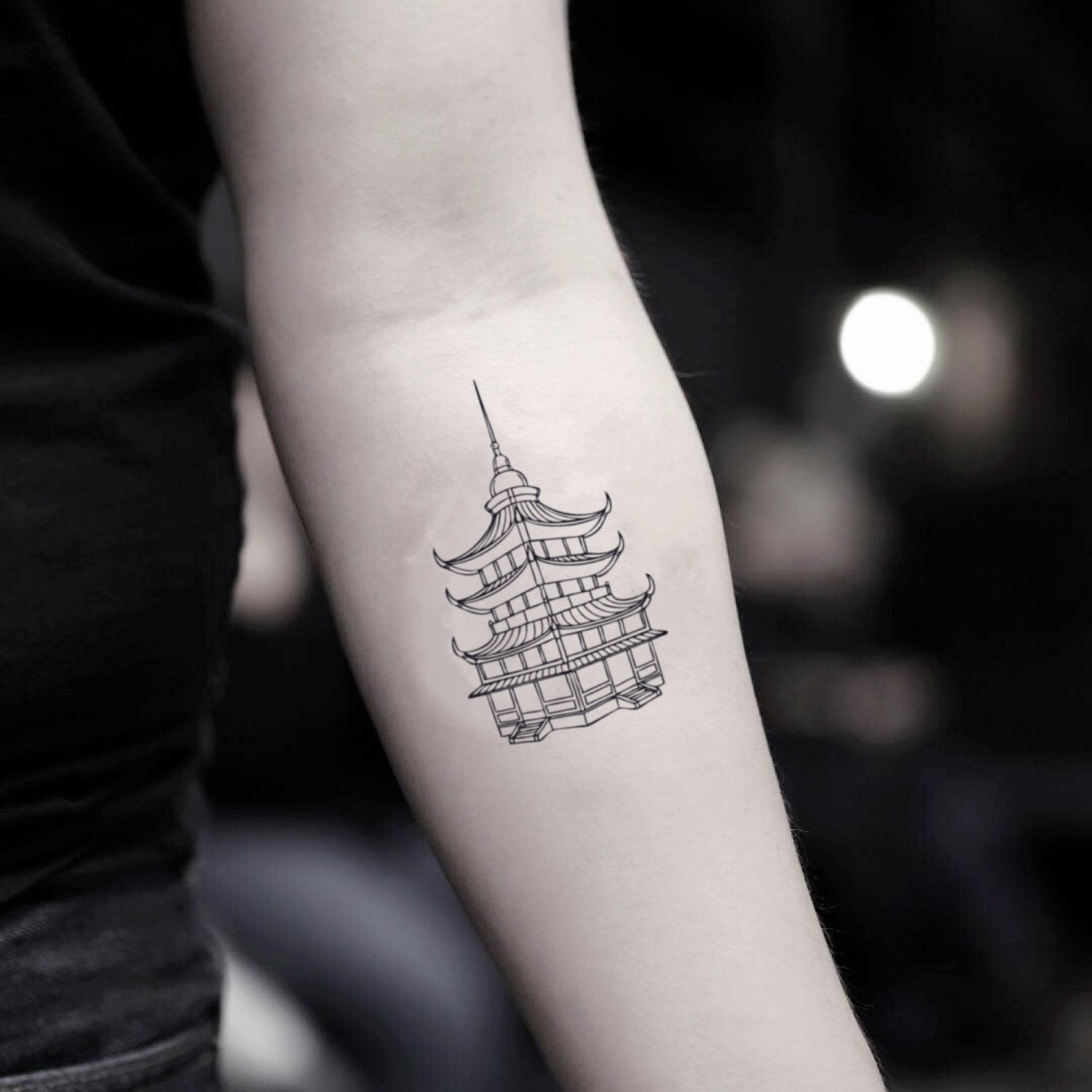 fake small pagoda illustrative temporary tattoo sticker design idea on inner arm