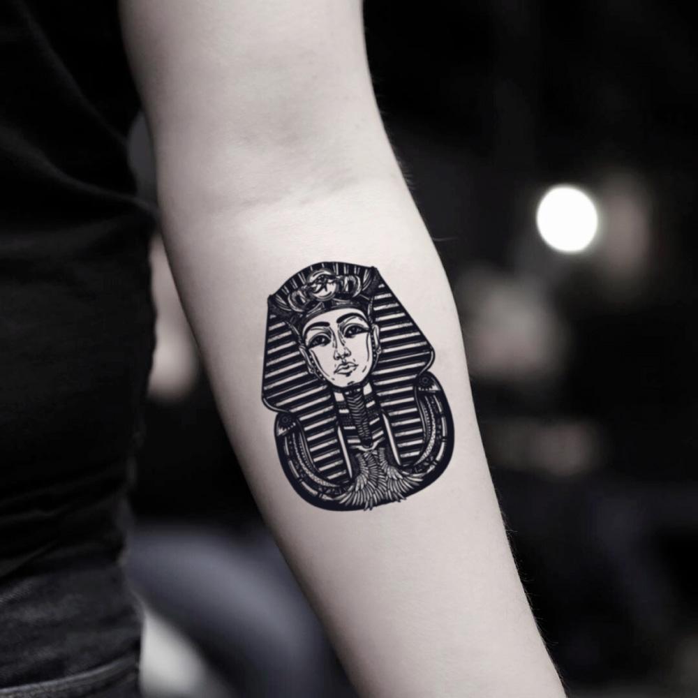 fake small pharaoh farao king tut illustrative temporary tattoo sticker design idea on inner arm