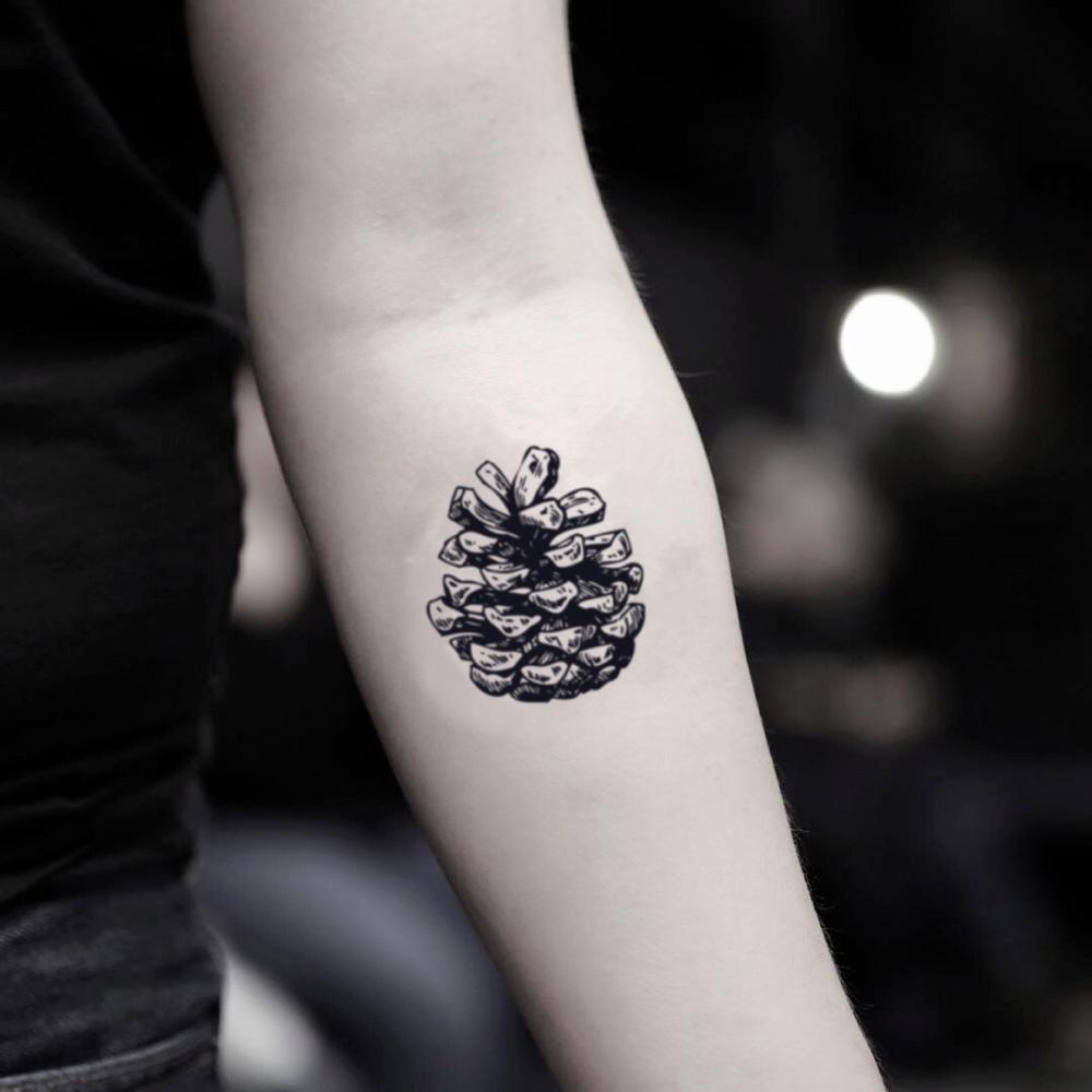 fake small pinecone pine cone nature temporary tattoo sticker design idea on inner arm