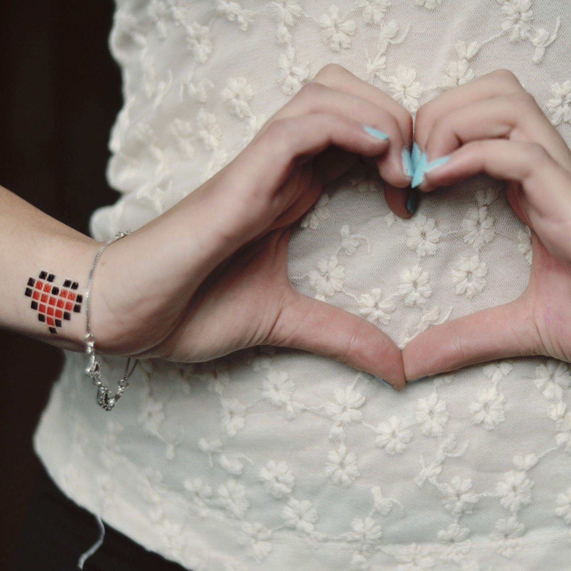 fake small pixelated pixel art heart undertale color temporary tattoo sticker design idea on wrist