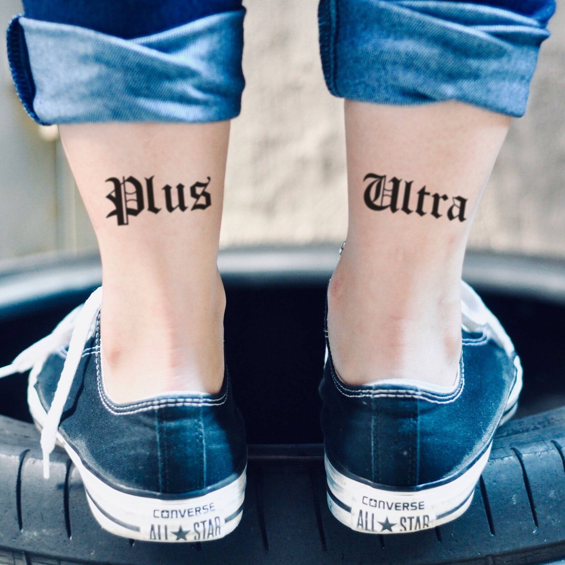 fake small plus ultra lettering temporary tattoo sticker design idea on ankle