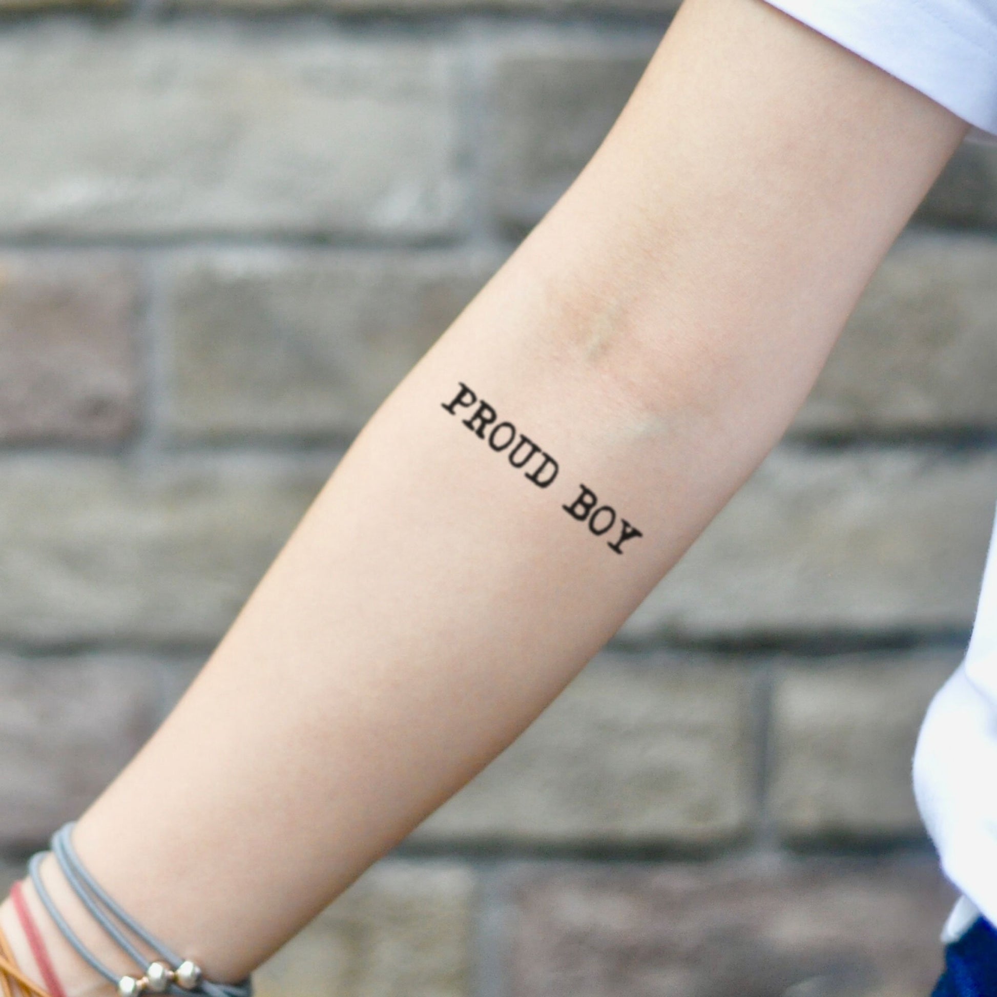 fake small proud boy lettering temporary tattoo sticker design idea on inner arm