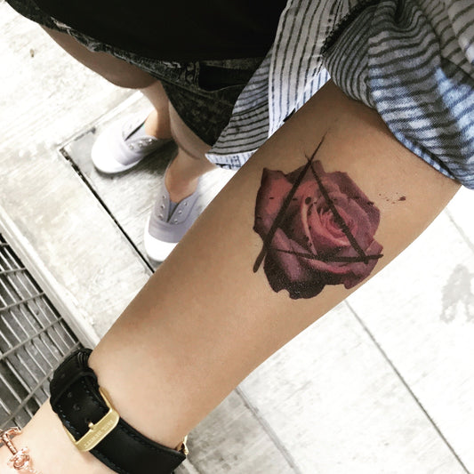 fake small purple color rose flower temporary tattoo sticker design idea on forearm