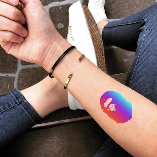 fake small rainbow bape color temporary tattoo sticker design idea on forearm