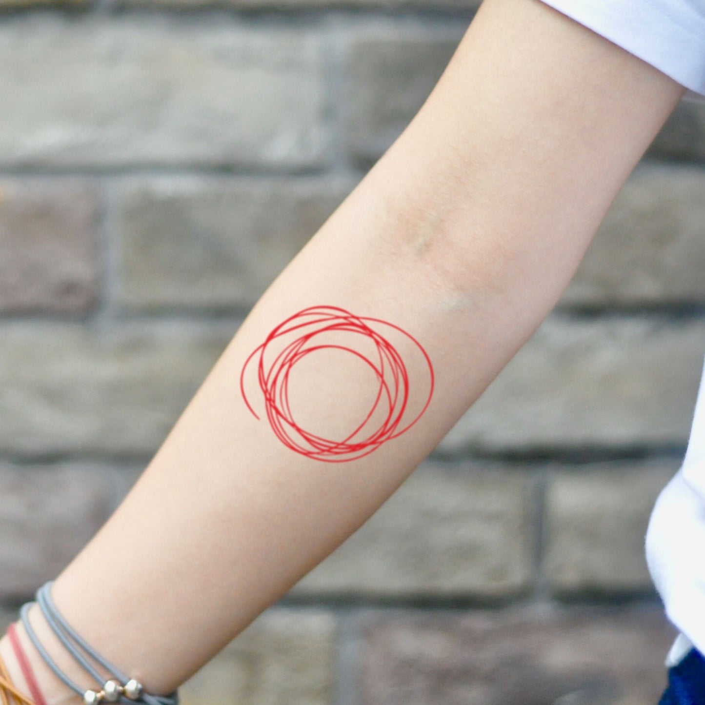 fake small scribble red line color temporary tattoo sticker design idea on inner arm