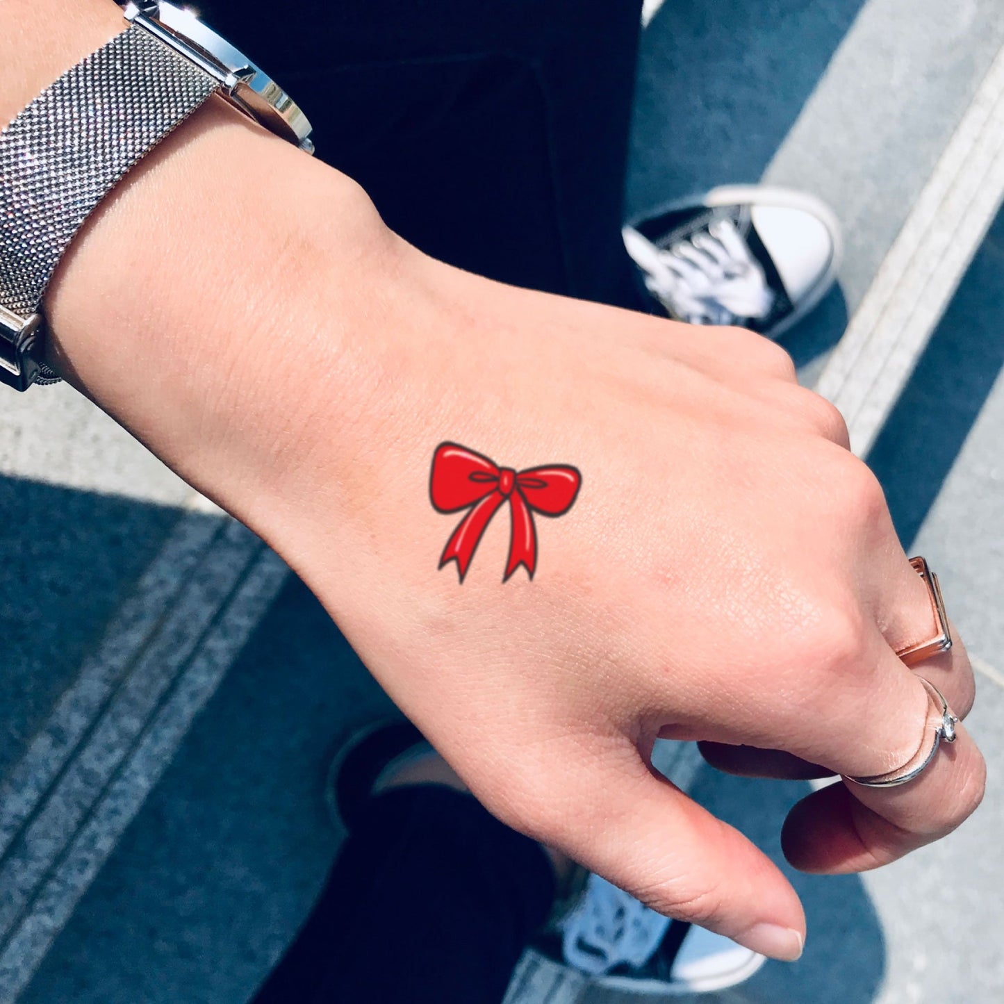 fake small red ribbon color temporary tattoo sticker design idea on hand