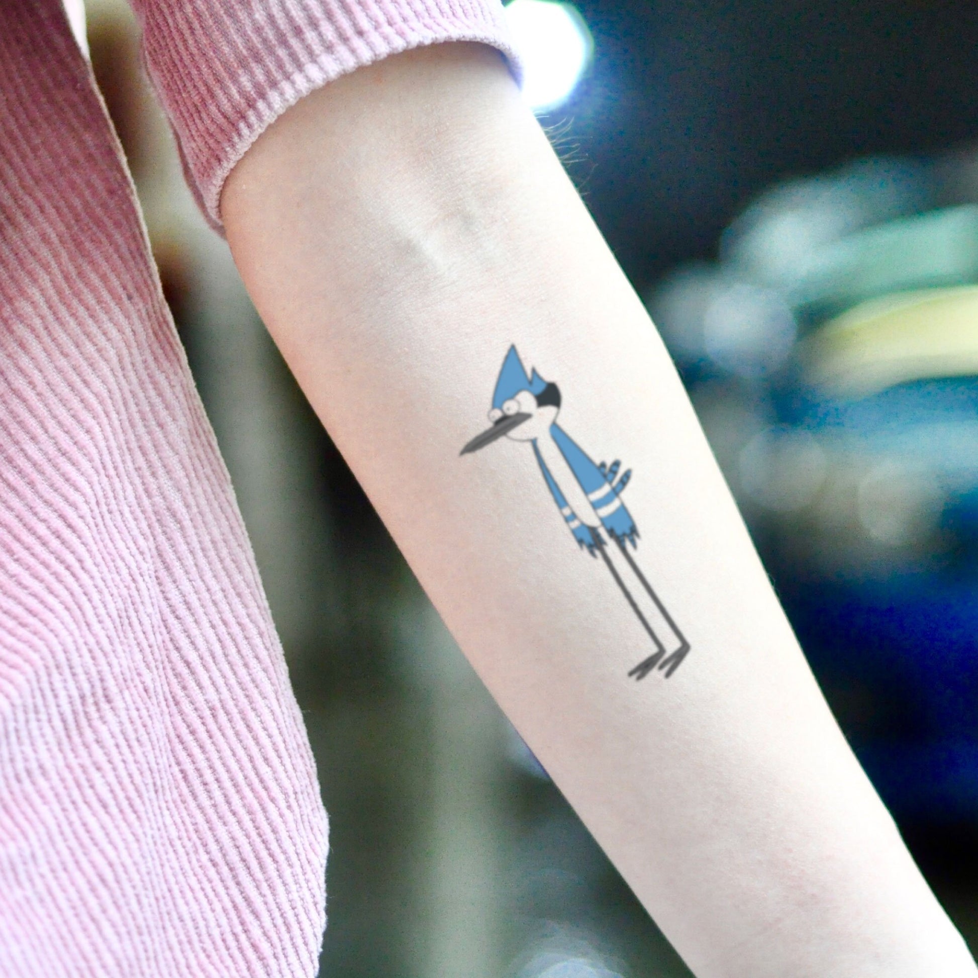 fake small regular show cartoon temporary tattoo sticker design idea on inner arm