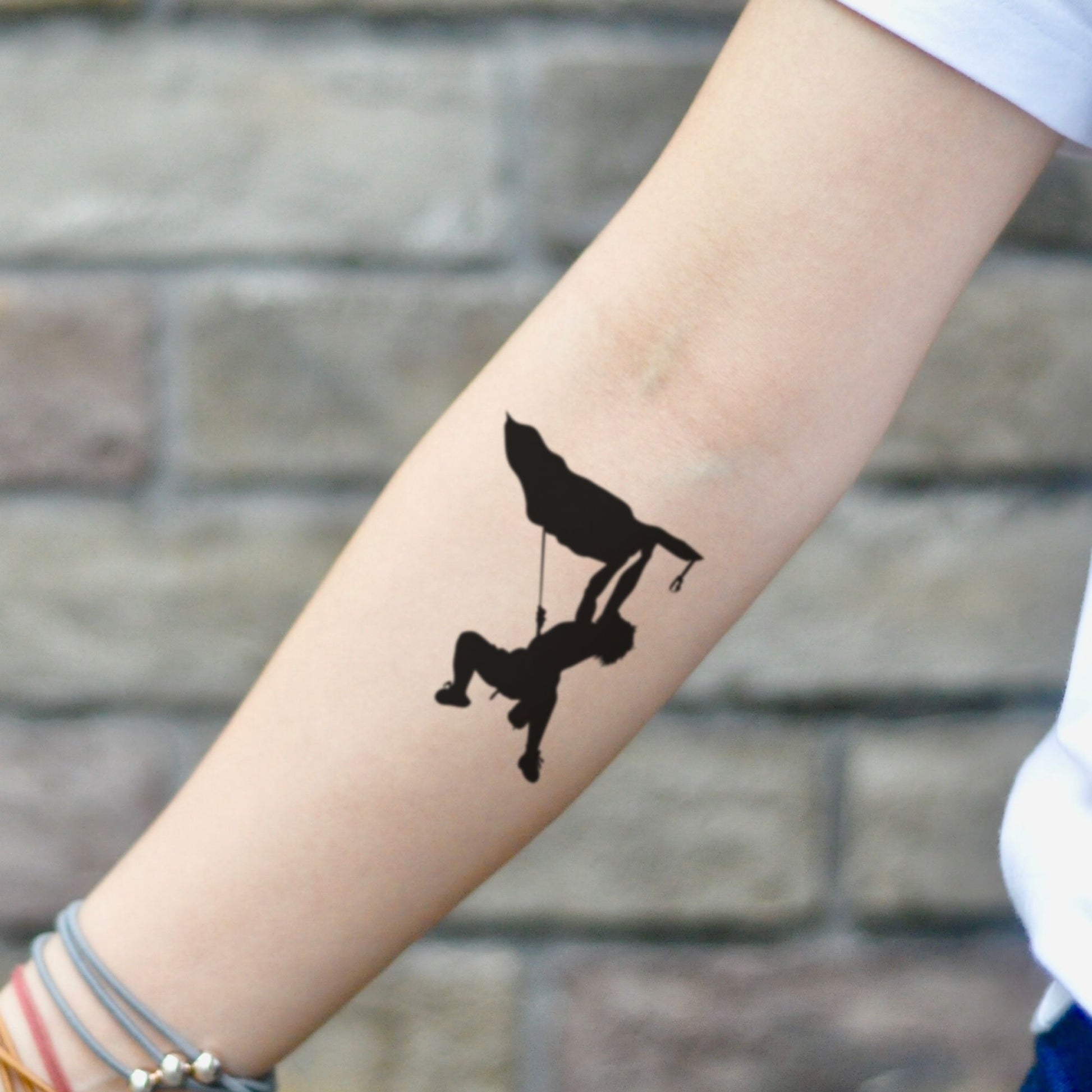 fake small rock climbing simple minimalist temporary tattoo sticker design idea on inner arm