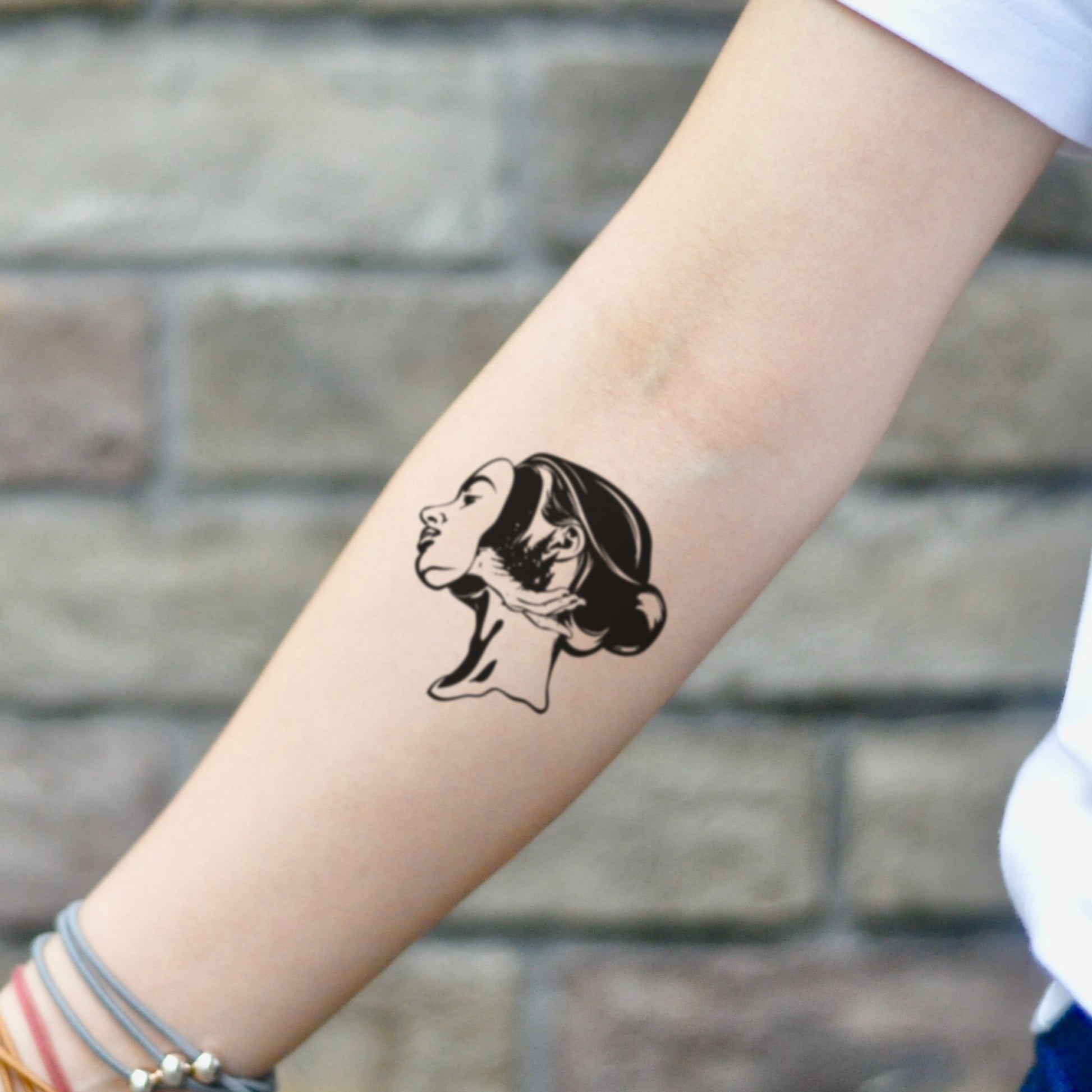 fake small sad girl surrealism abstract art illustrative temporary tattoo sticker design idea on inner arm