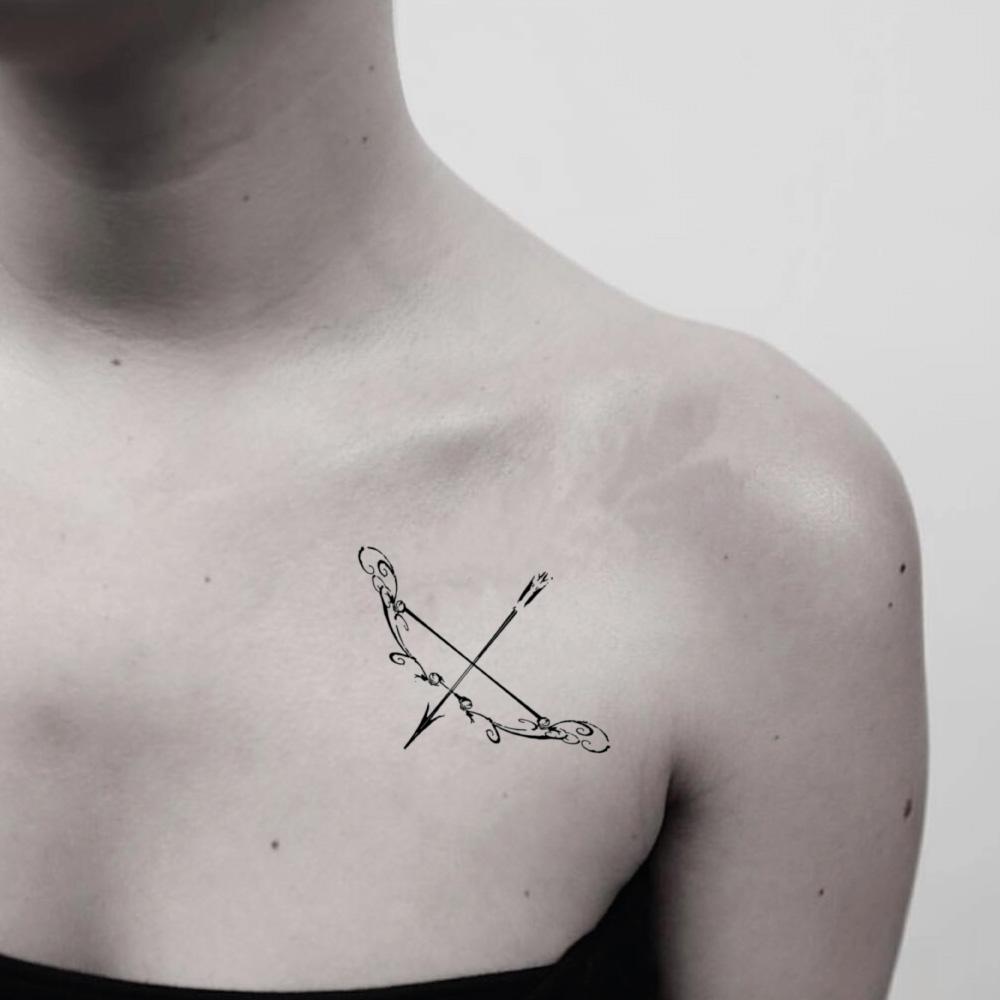 fake small sagitario sagittarius zodiac sign illustrative temporary tattoo sticker design idea on shoulder