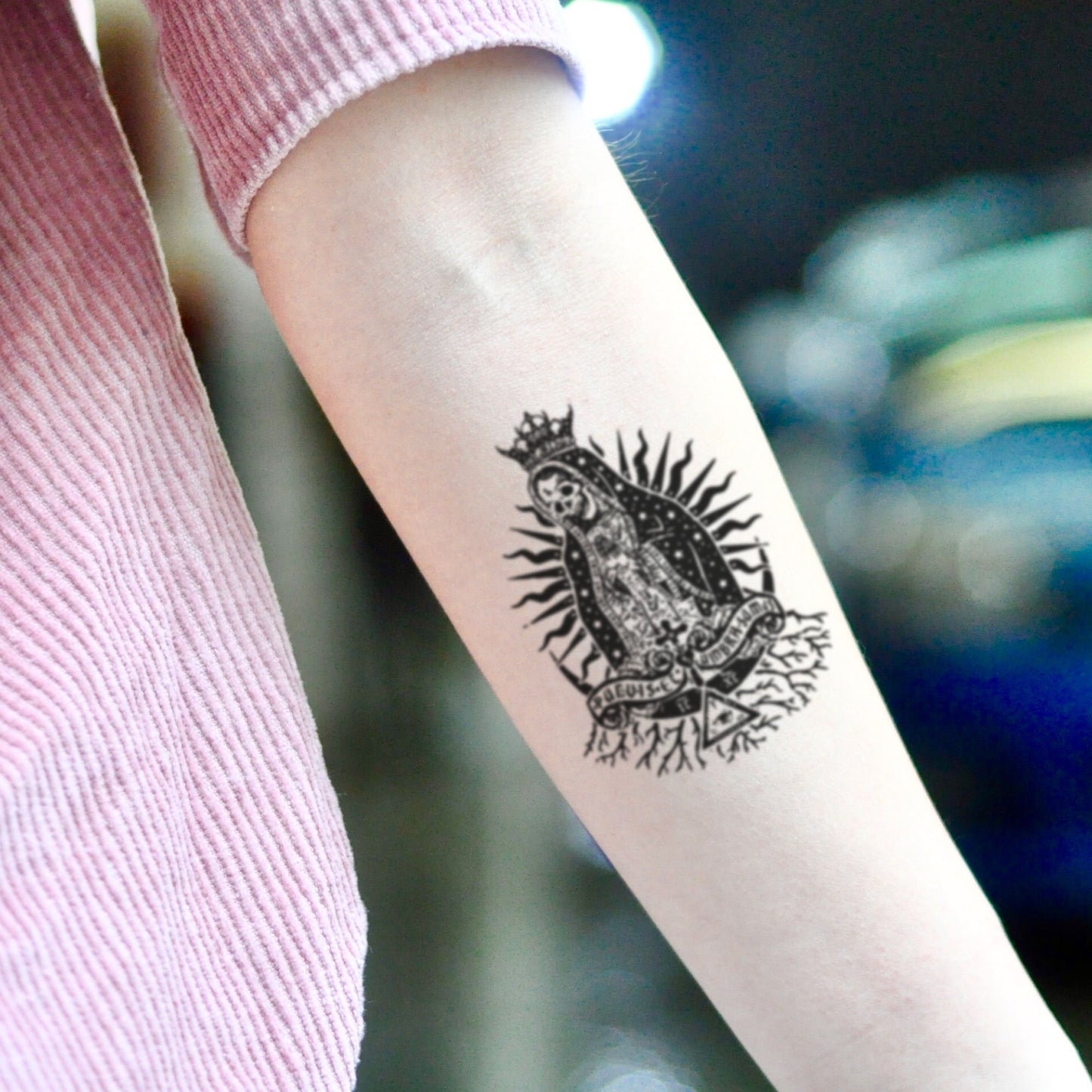 fake small santa muerte illustrative temporary tattoo sticker design idea on inner arm