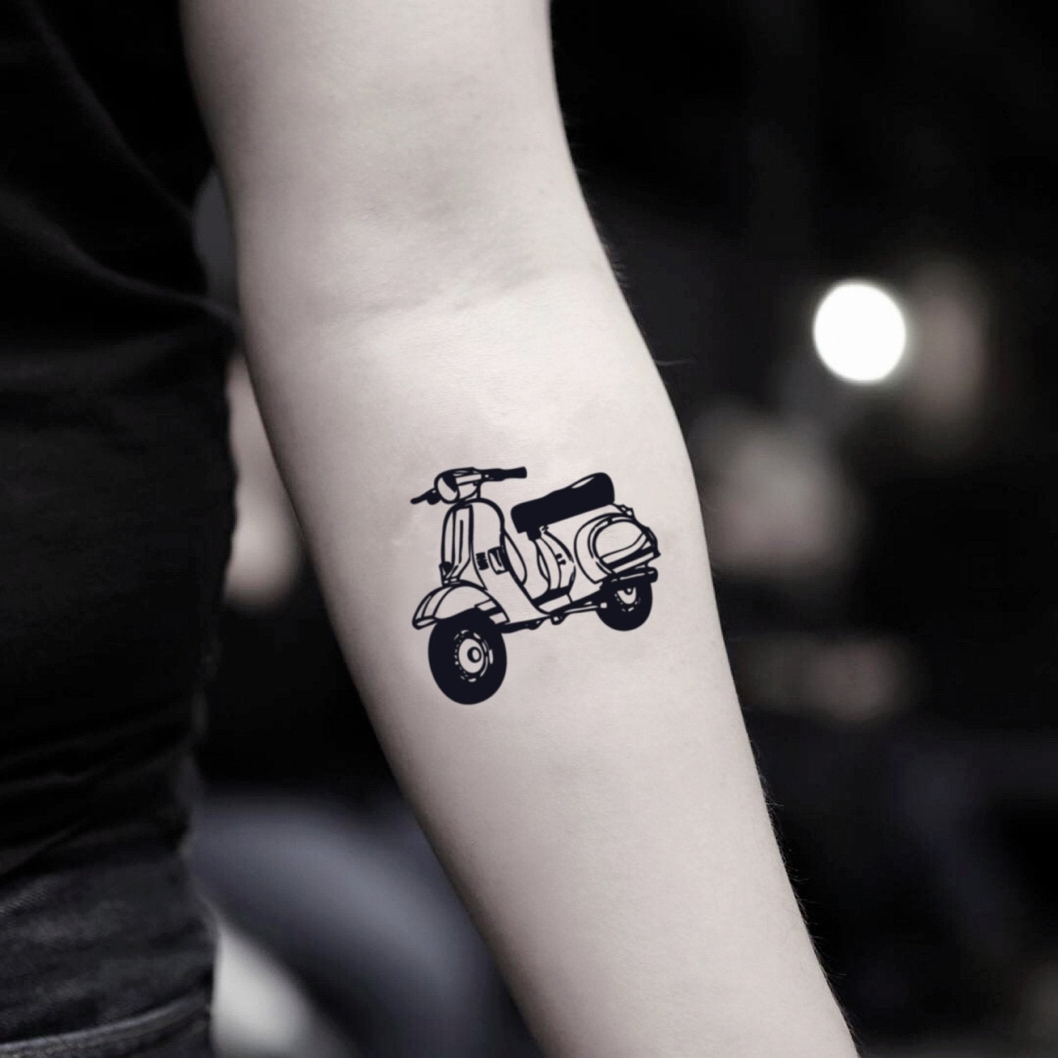 fake small scooter illustrative temporary tattoo sticker design idea on inner arm