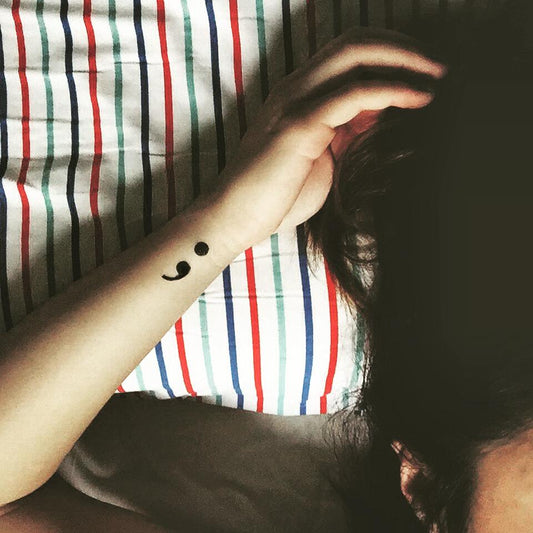 fake small semicolon semi colon minimalist temporary tattoo sticker design idea on wrist
