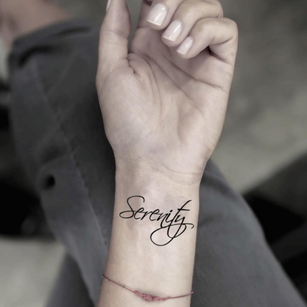 fake small serenity lettering temporary tattoo sticker design idea on wrist