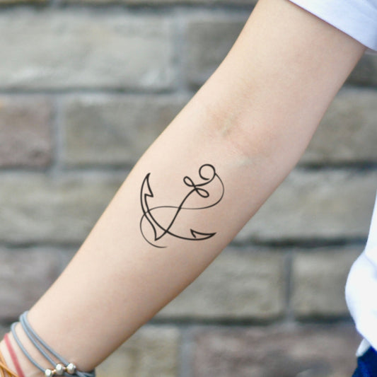 fake small ship anker minimalist temporary tattoo sticker design idea on inner arm