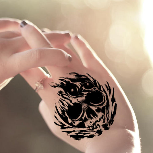 fake small evil skull diablo good nice hand illustrative temporary tattoo sticker design idea on wrist
