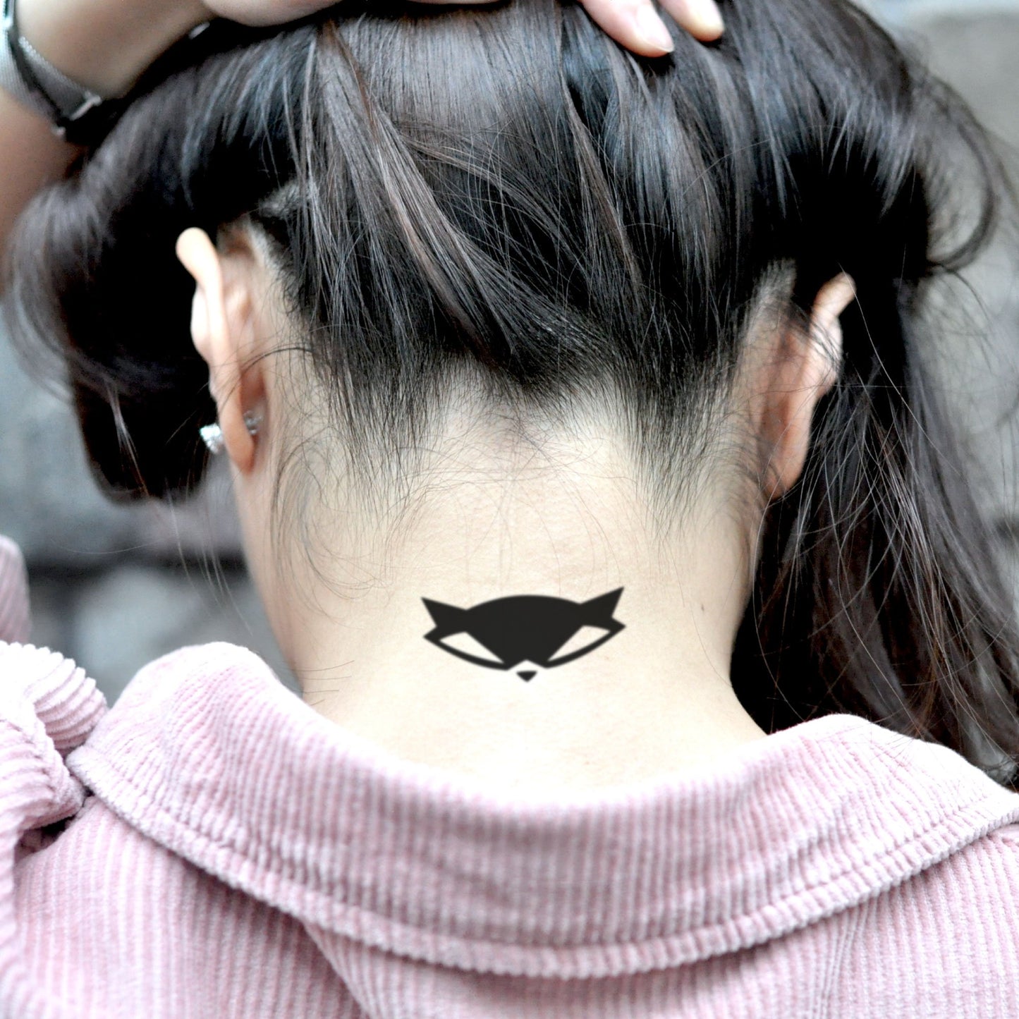 fake small sly cooper logo minimalist temporary tattoo sticker design idea on neck