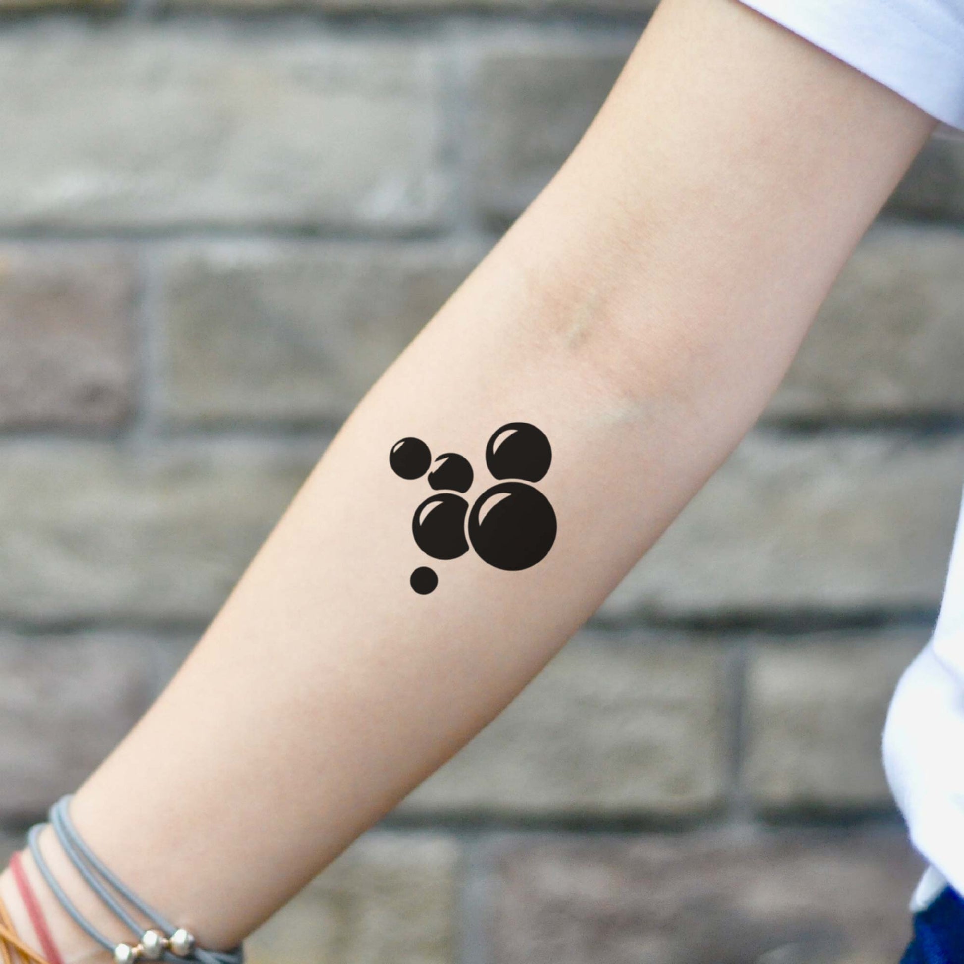 fake small soap bubbles minimalist temporary tattoo sticker design idea on inner upper arm forearm