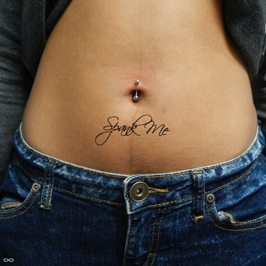 fake small spank me lettering temporary tattoo sticker design idea on stomach