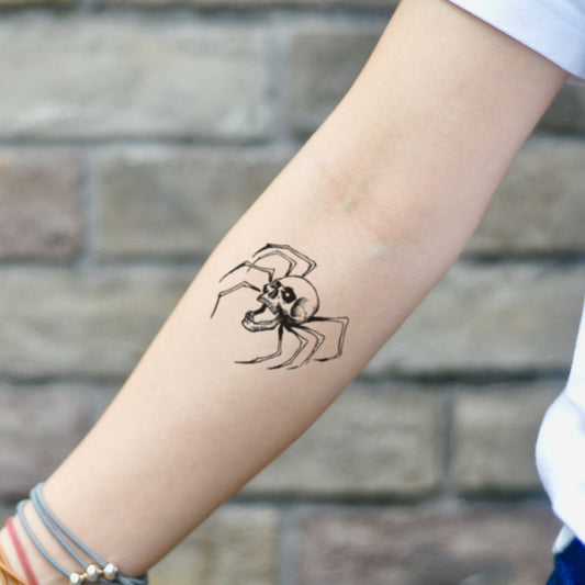 fake small spider skull tarantula illustrative temporary tattoo sticker design idea on inner arm