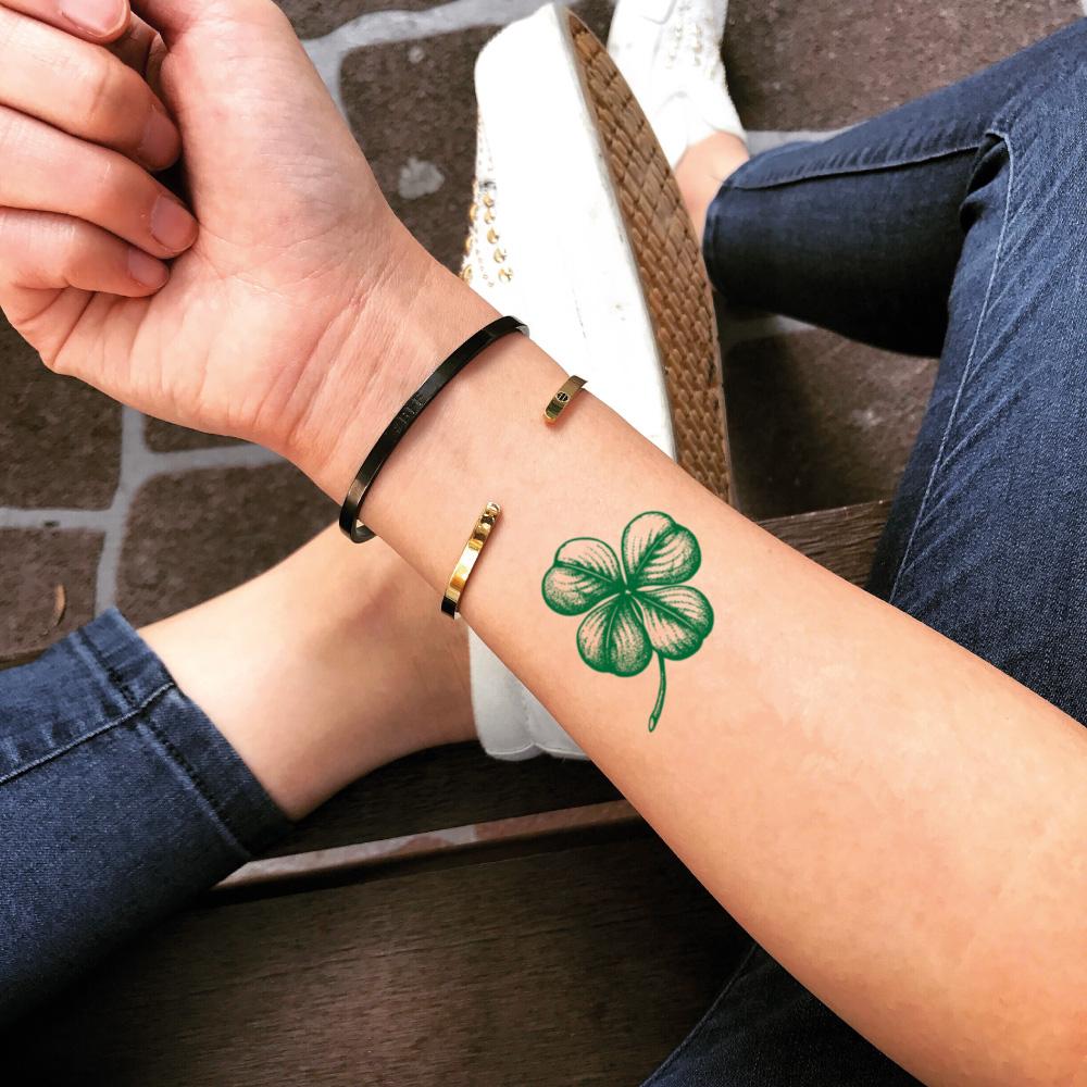 fake small st patricks day clover leaf shamrock color temporary tattoo sticker design idea on wrist