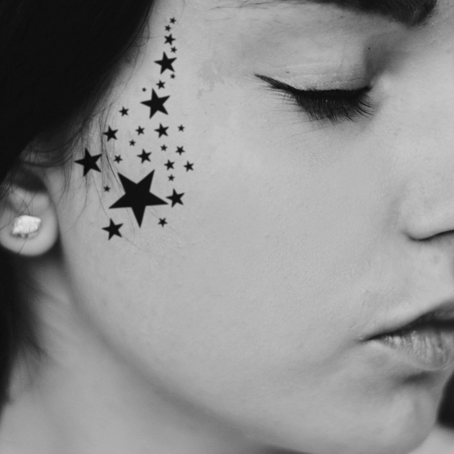 fake small stars minimalist temporary tattoo sticker design idea on face