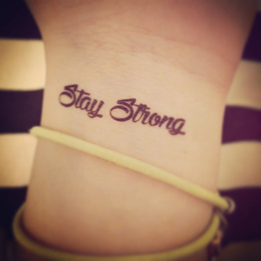 fake small stay strong quote lettering temporary tattoo sticker design idea on wrist