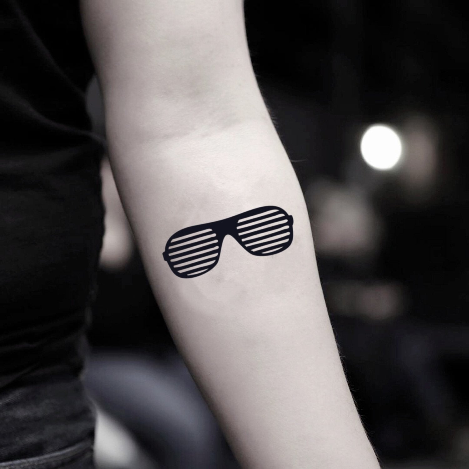fake small sunglasses illustrative temporary tattoo sticker design idea on inner arm