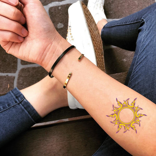 fake small tangled sun ring of fire color temporary tattoo sticker design idea on forearm